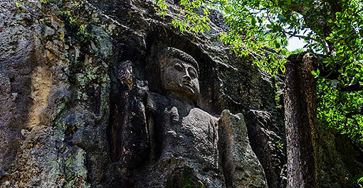 Sculptures on the rock walls of Dhowa Rock Temple in Srilanka